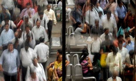 Crowded train station in India on the eve of World Population Day 2012