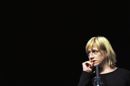 Floyer bites her nails during a Nail Biting Performance at Documenta 13 in Kassel, Germany, in 2012.