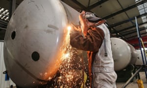 A worker welding a liquefied natural gas (LNG) tank at a factory in Nantong in China’s eastern Jiangsu province.