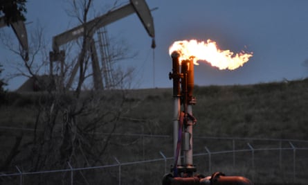 A flare to burn methane from oil production in North Dakota, US.