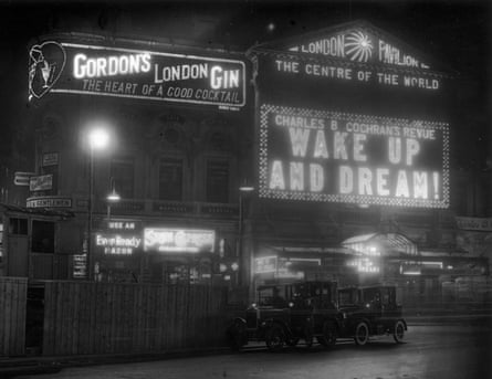 Electric signs outside the London Pavilion in Piccadilly Circus, advertising the Charles B Cochran revue ‘Wake Up and Dream!’, as well as Gordon’s Gin, State Express cigarettes and the Ever Ready razor, July 1929.