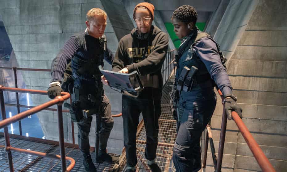 Lashana Lynch with Daniel Craig and Cary Joji Fukunaga in No Time to Die.