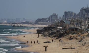 Construction work on the Gaza City shore in preparation for a floating pier the US military is building at sea.