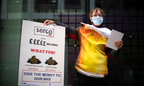 A campaigner outside the Department of Health and Social Care in London.