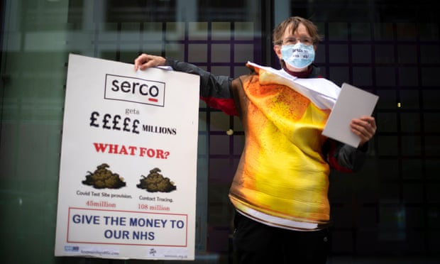 Demonstrator at a protest against Serco’s handling of the test-and-trace system at the Department of Health and Social Care in London
