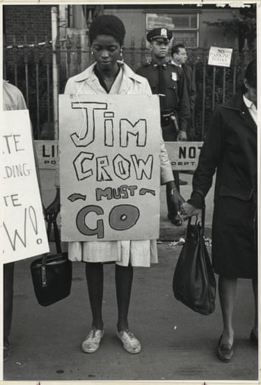 a women holding a sign
