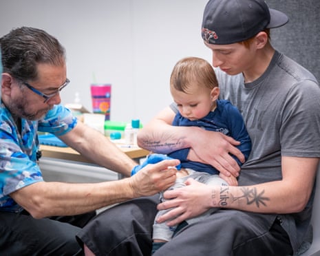 a toddler getting a vaccine