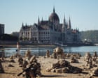 Lost income, energy fears and a woolly mammoth: what Europe’s dried-up rivers have yielded