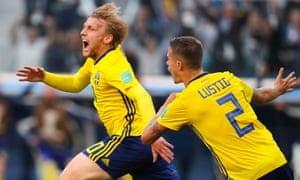 Emil Forsberg, left, celebrates with Mikael Lustig after scoring the only goal of the game against Switzerland.