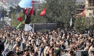 Afghan Shiites beat themselves with chains and blades to mark Ashura outside the Abul Fazel Shrine in Kabul, Afghanistan, Tuesday, 10 September 2019.
