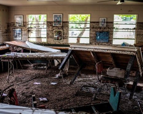 Damaged items lie inside of a cabin at Camp Mystic.