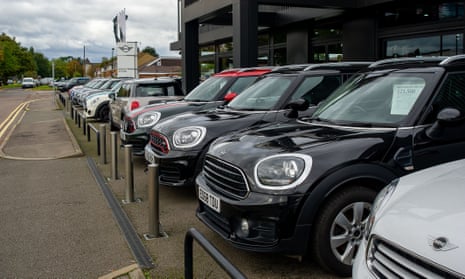 Minis in a showroom in Slough