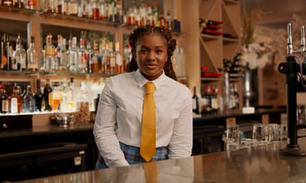 Lola Aluko as a bartender in The Wedding.