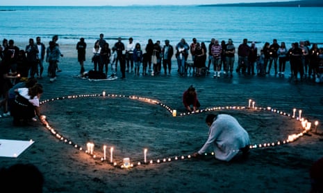 A vigil on Takapuna beach, Auckland, in memory of the Christchurch mosque attacks.