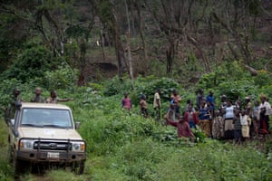 Park rangers talk to autochthon people who have just felled a large area of trees for charcoal on the edge of the Kahuzi-Biéga national park