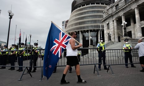 Hundreds of people protested over Covid-related concerns outside New Zealand's parliament in Wellington.