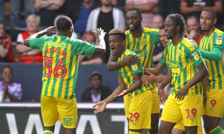 West Bromwich Albion players celebrate with Grady Diangana, centre, after he made it 1-1 against Luton Town.