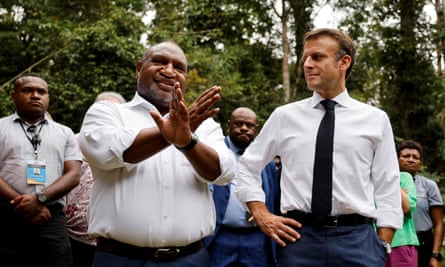Papua New Guinea’s prime minister James Marape and France’s president Emmanuel Macron speak in Port Moresby on Friday.