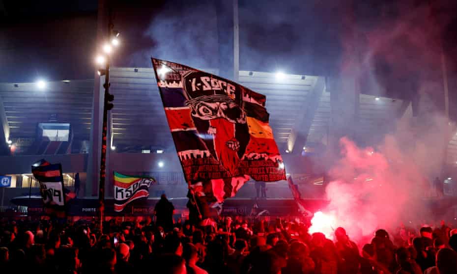 PSG fans celebrate the title outside Parc des Princes, after several supporters left the match early.