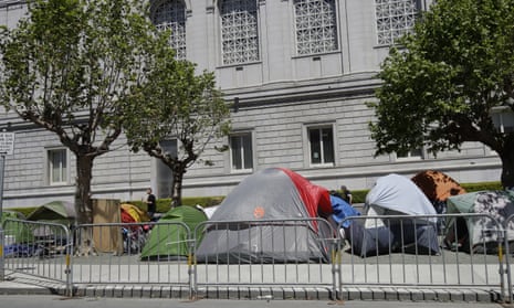 tents behind a barricade