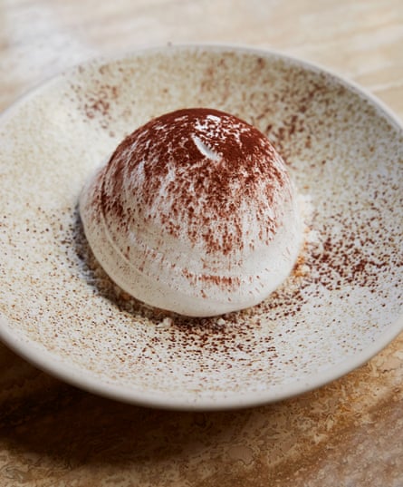 ‘A coconutty work of art’: Milk Beach’s lamington with morello cherry, chocolate semifreddo and coconut.