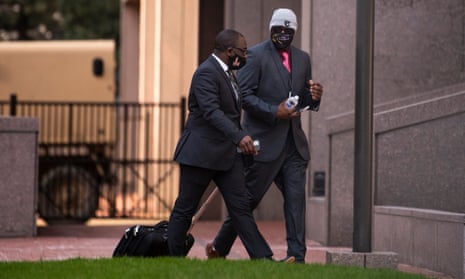 Philonise Floyd (right), brother of George Floyd, arrives outside the Hennepin County Government Center on Friday.