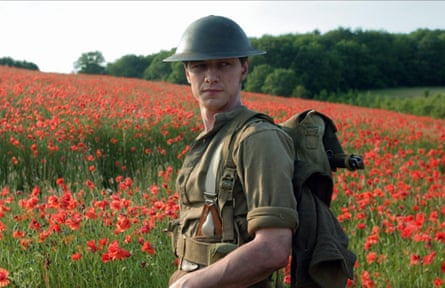 McAvoy in army uniform and helmet, standing in front of a field of poppies, in Atonement