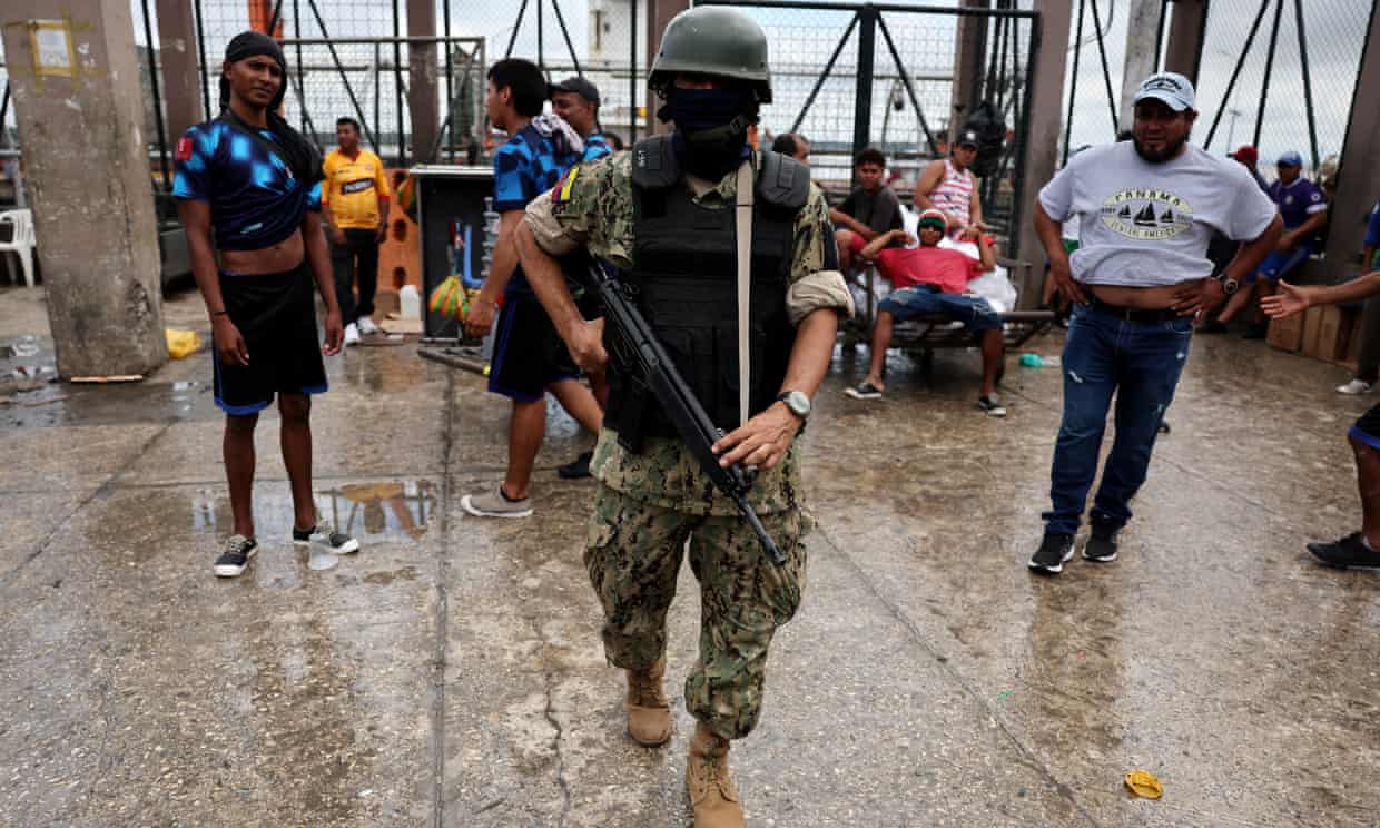 A soldier patrols in a commercial area, in the aftermath of a wave a violence, in Guayaquil, Ecuador, on Thursday. Photograph: Iván Alvarado/Reuters
