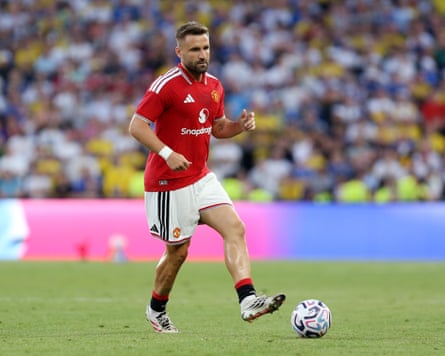 The Manchester United left-back Luke Shaw plays a pass during his team’s pre-season friendly against Leeds United at Croke Park in Dublin.