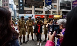 Members of historical group Watershed pose in Hong Kong during an event marking 75 years since the British surrendered to the Japanese during World War II.