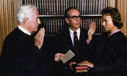 Sandra Day O’Connor being sworn in as the first female justice of the supreme court by Chief Justice Warren Burger in Washington, 1981. Her husband John is holding the family Bibles.