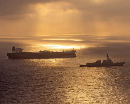 A US destroyer implements a maritime blockade against the Iran-flagged crude oil tanker last month.