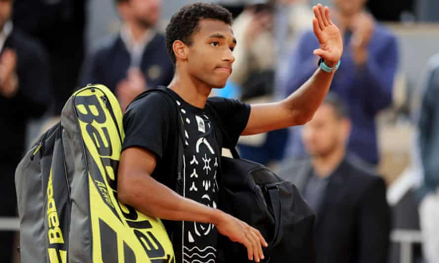 Canada’s Felix Auger-Aliassime acknowledges fans after losing.