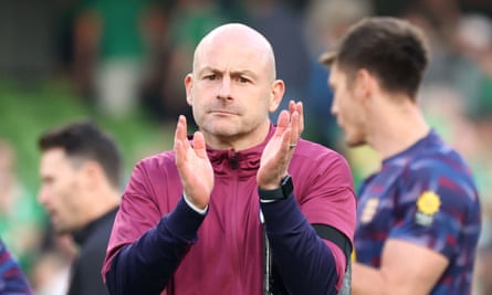 Lee Carsley applauds the England fans after the match
