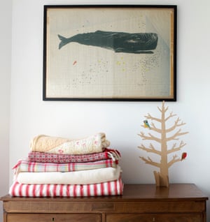 A plywood tree and screenprint by Turley, on a vintage chest