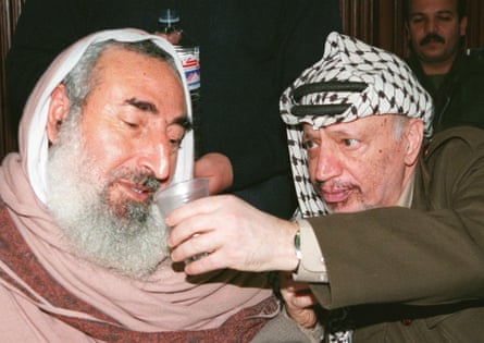 Sheikh Ahmad Yassin and Yasser Arafat in Gaza City in January 1998.