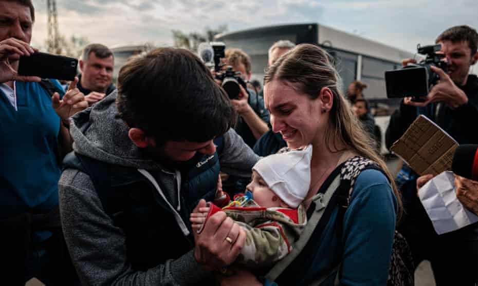 Azovstal steel plant escapees Anna Zaitseva and her son Svyatoslav, six months, after arriving in Zaporizhzhia.