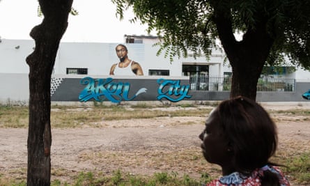 A portrait of Akon by a graffiti artist adorns the walls of a youth centre