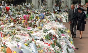 1997: Elizabeth and Philip view floral tributes to Diana, Princess of Wales, outside Buckingham Palace