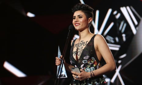 Sydney artist Montaigne, aka Jess Cerro, accepts the Aria for breakthrough artist during the 30th annual Aria awards at The Star in Sydney on Wednesday night. 
