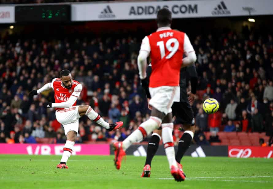 Alexandre Lacazette of Arsenal scores his sides fourth goal.