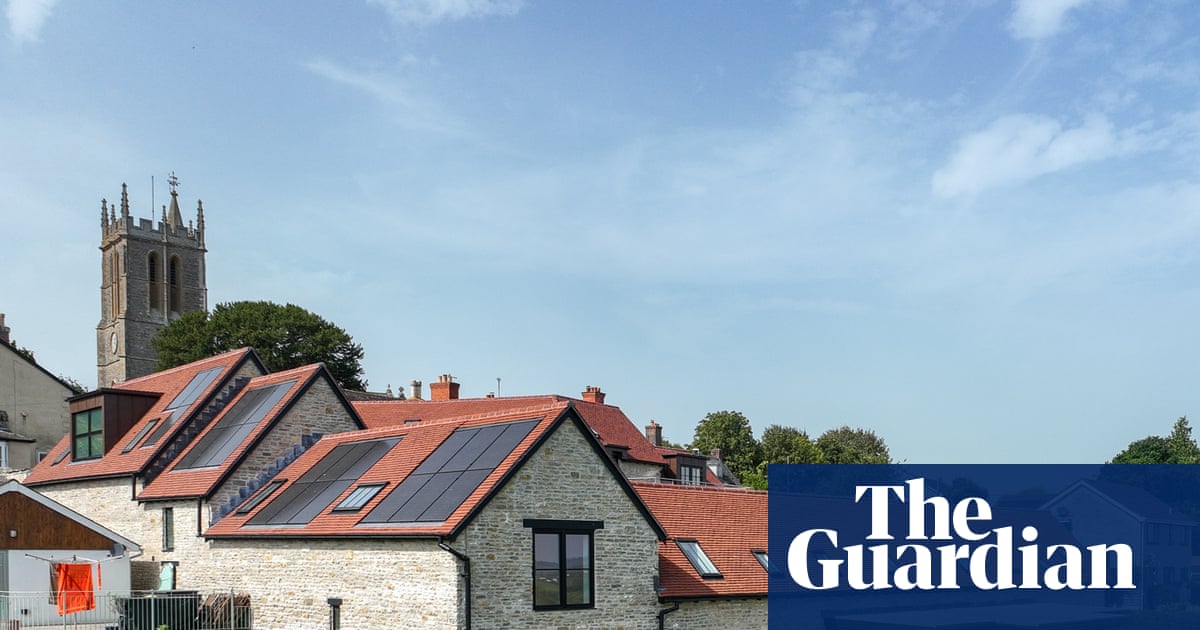 Homes with air source heat pumps or solar panels for sale in England – in pictures