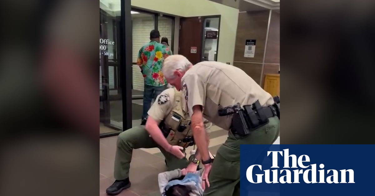 Officer pushes woman to ground and arrests her at Utah county datacenter hearing