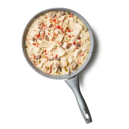 Simmer until the sauce thickens, then stir in the pimentos and chopped chicken, plus a dash of Tabasco and/or lemon juice. Check the seasoning, adjust to taste, then serve topped with a scattering of roughly chopped herbs.