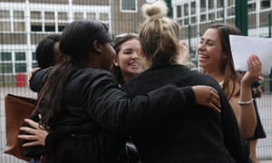 Students collect their A-level results at a north London school