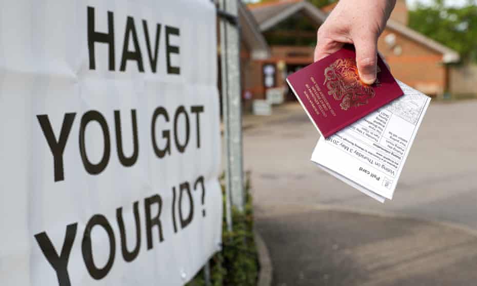 A voter with passport and poll card