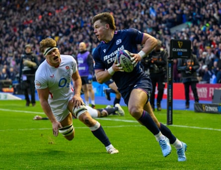 Huw Jones scores Scotland’s first try against England.