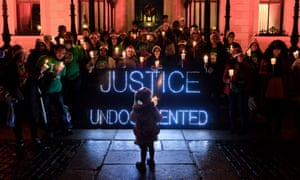 Undocumented adults and children hold a candlelit memorial for loved ones lost in 2015, organised by Migrant Rights Centre Ireland outside the Mansion House in Dublin