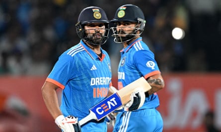 Rohit Sharma and Virat Kohli run between the wickets against Australia in Rajkot in September
