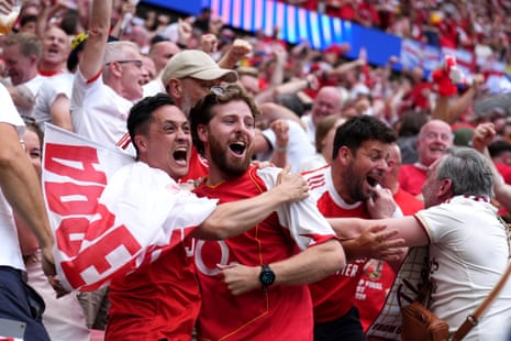 Arsenal fans celebrate the opening goal of the game scored by Kai Havertz (not in picture).